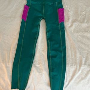 Fabletics leggings teal color in Large with tags